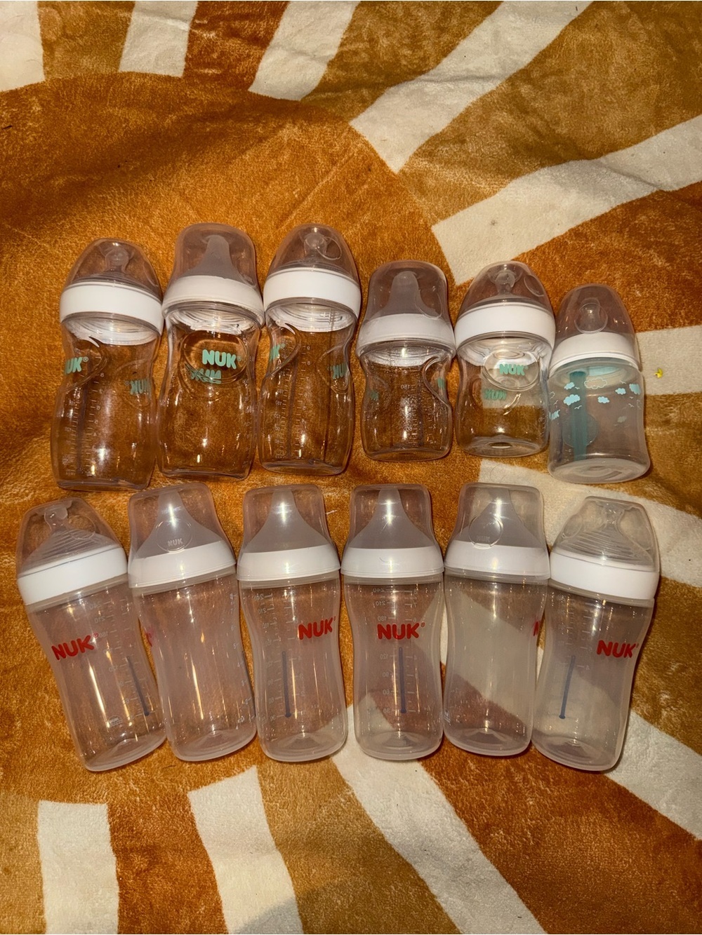 NUK Baby Bottle Set in Clear with White Caps